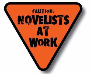 Caution sign that says "Novelists at work"